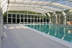 Cubierta de piscina telescópica.